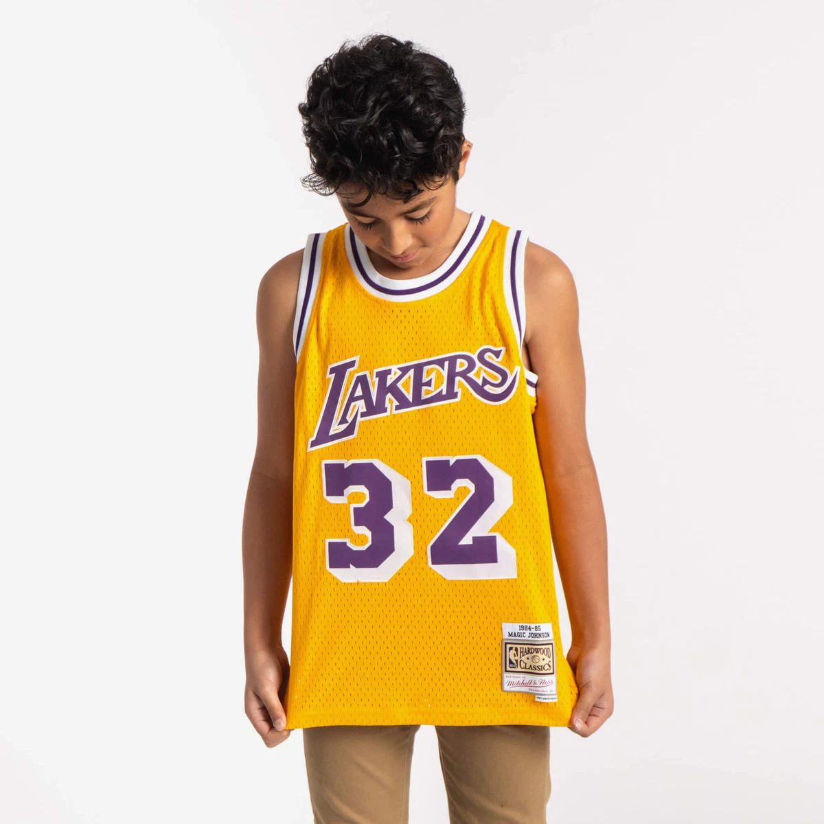 Magic Johnson Los Angeles Lakers Mitchell & Ness Youth 1984-85 Hardwood  Classics Swingman Throwback Jersey - Purple