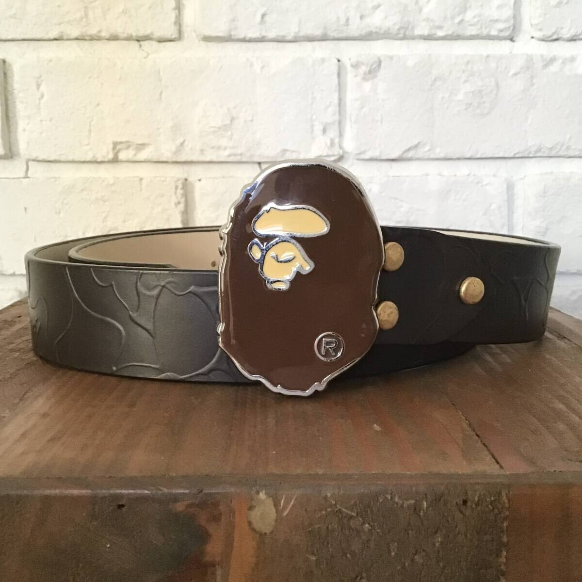 A BATHING APE レザーベルト BAPE LOGO CAMO APE HEAD buckle BAPE camo embossed leather belt A Bathing