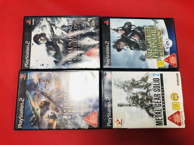 Medal of HonorRising Sun, Vanguard, Metal Gear Solid 2, Great Deals!Large