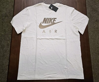 silver and white nike shirt