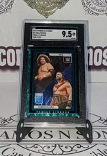 2023 Panini Donruss Elite WWE Family Lineage Roman Reigns/Sika Teal /25 SGC 9.5