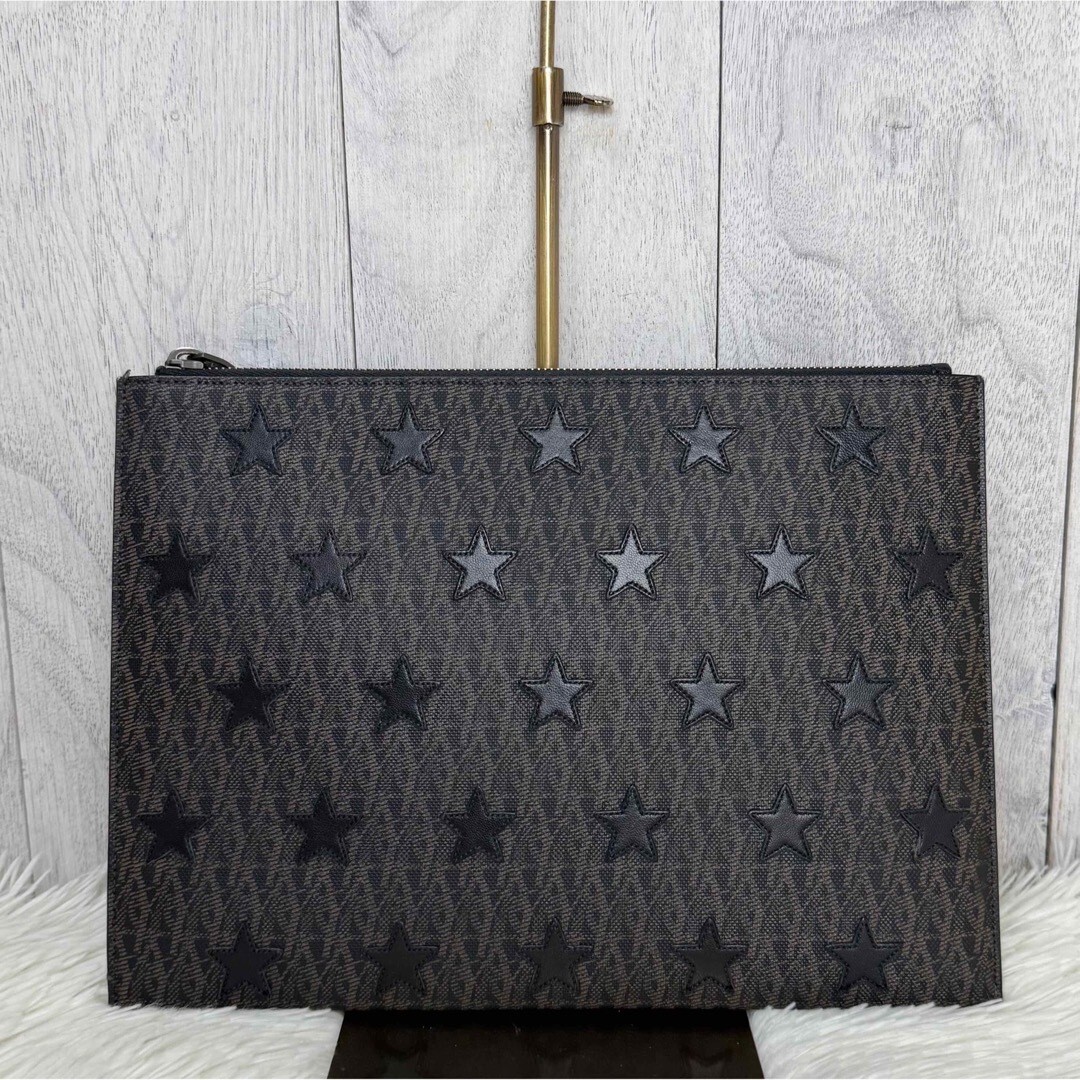 Pochette Saint Laurent modello stella modello all over nera uomo usata