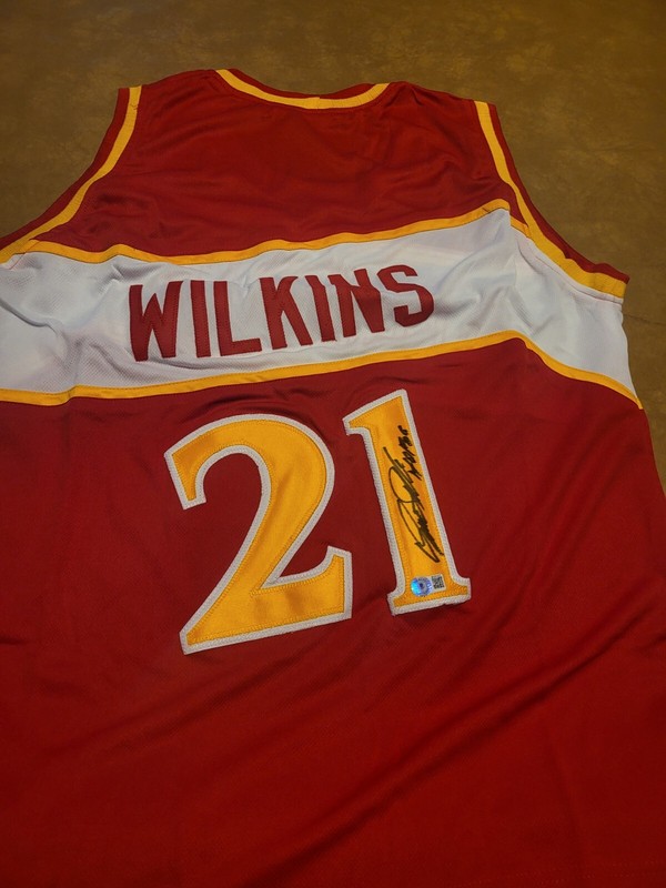 ATLANTA HAWKS DOMINIQUE WILKINS AUTOGRAPHED "HOF 06" RED JERSEY BECKETT 
