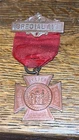 Civil war Women’s relief corps reunion badge