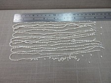 7 strands 16" Vtg Loose Freshwater Rice Pearls 21.56 Grams