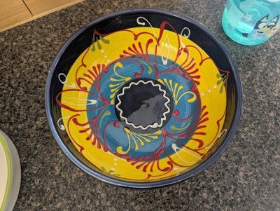 hand-painted Spanish ceramic bowl featuring a vibrant yellow and turquoise