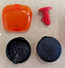 Genuine Peg Perego Parts Kit - Hubcaps, Lens Cover, & Hood Lock