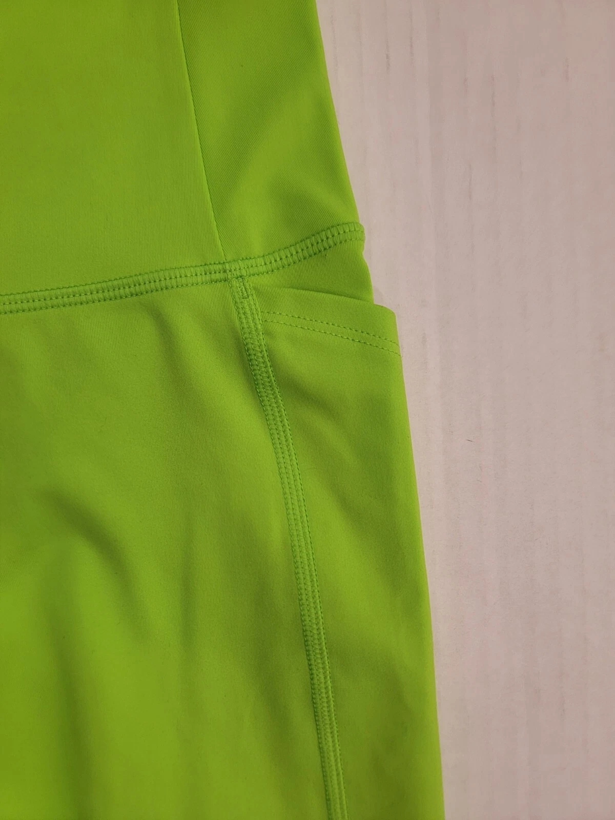 girlfriend-collective compression high rise side pockets shorts