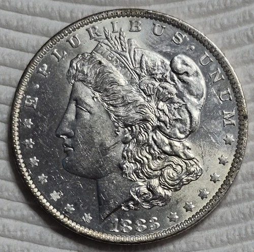 1883 O Uncirculated Morgan Silver Dollar. Multiple Die Cracks. Video A0761.