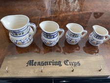 Vintage 1950&rsquo;s Royal Sealy Blue & White Ceramic Measuring Cups w/ Wall Bracket