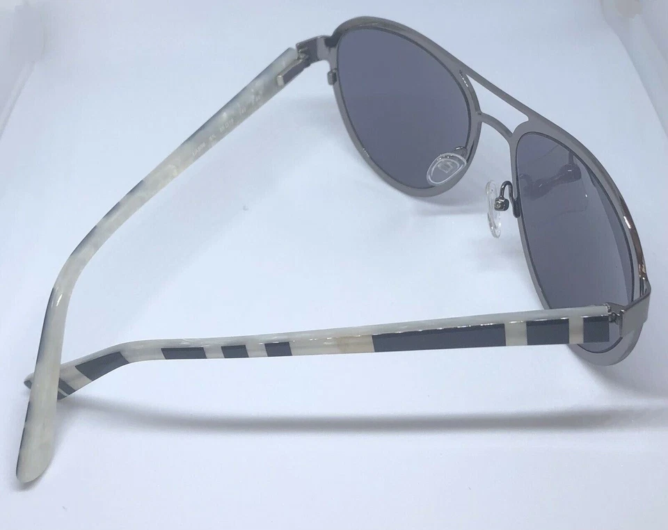 Gafas de sol L.A.M.B con marco plateado y hielo LA556 55-18-140 B:48 lentes espejadas grises Foto 3 de 4