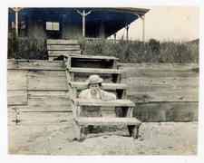 ANTIQUE NY PHOTO STRANGE DRUNK WOMAN ON BEACH UNDER STAIRS SNAPSHOT VINTAGE HAT