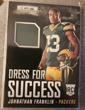 2013 Rookies & Stars Dress for Success Johnathan Franklin Rookie Jersey Card 