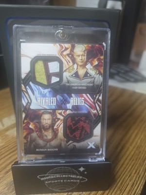 2025 Topps Exalted WWE Cody Rhodes/Roman Reigns Rivaled Dual Relics Black 1/1
