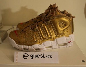 nike supreme oro prezzo