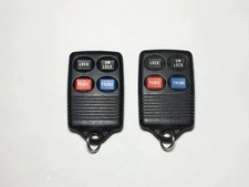 PAIR OF 2 OEM FORD LINCOLN MERCURY 4 BUTTON KEYLESS REMOTE ENTRY FOB GQ43VT4T