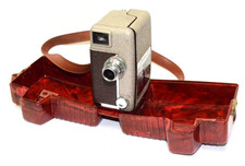 REVERE 8 MODEL B-61 REGULAR 8 MOVIE CAMERA W/PLASTIC CLAMSHELL CASE. Works nice.