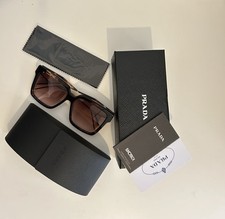 Prada PR 24ZS women's sunglasses in a tortoiseshell