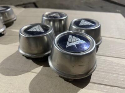 nissan bluebird 910 wheelcaps central caps | eBay