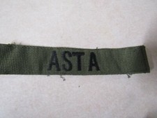 MILITARY PATCH OLDER COMBAT USED NAME TAPE OD GREEN SEW ON WITH NAME ASTA