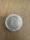 1880 Silver Dollar In Plastic Capsule With Eagle On Back