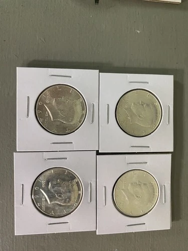 Nice Lot Of 4 Proof 90 % Kennedy Half Dollars.