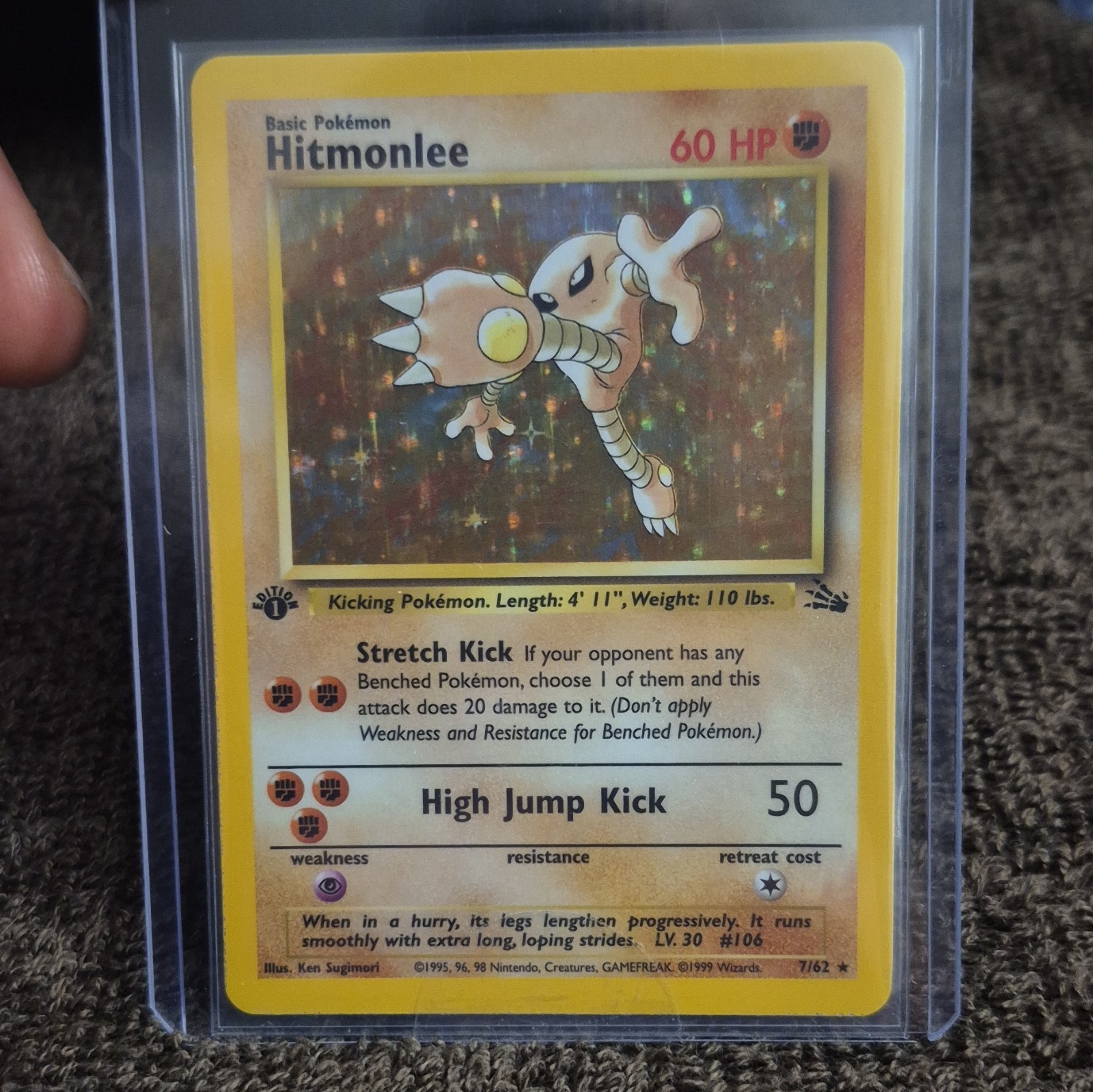 Pokémon TCG Hitmonlee 1st edition Holo Rare Fossil 7/62 1999 English Basic NM