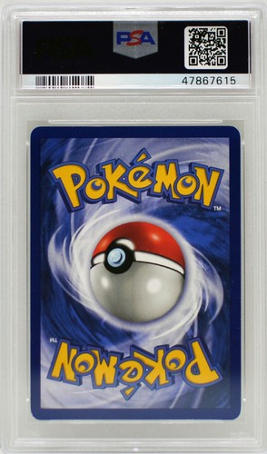 PSA 7 NEAR MINT Pokémon 1st Edition Base Set double colorless energy card with silver ball on blue-yellow border.