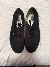 All-black Vans Authentic  clean, low-profile look. Slight wear but still solid.