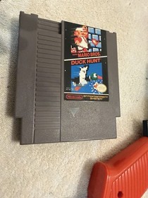 Nintendo Nes System, Mario Brothers, And Duck Hunt Game With Gun ￼
