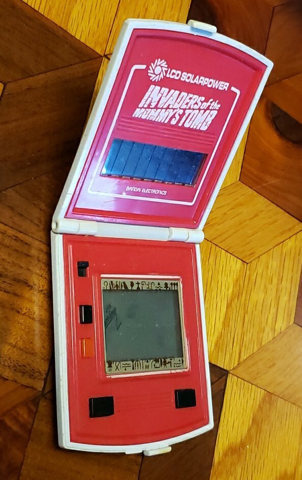 Vintage Invaders of the Mummy's Tomb Bandai LCD Game Solar Power