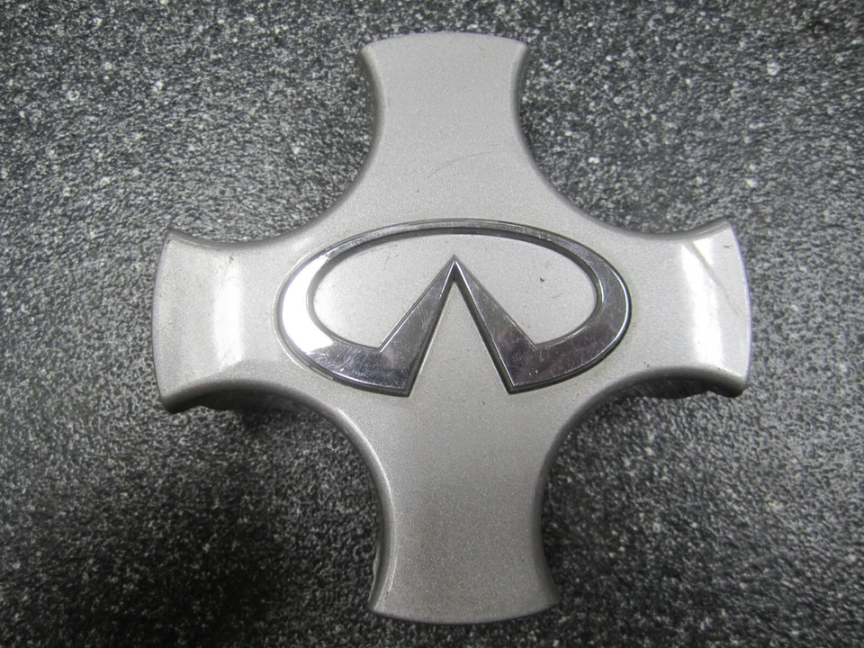 Una (1)* Tapa central plateada Infiniti G20 1991-1996 14" OEM 40342-63J00 73630 Foto 2 de 4