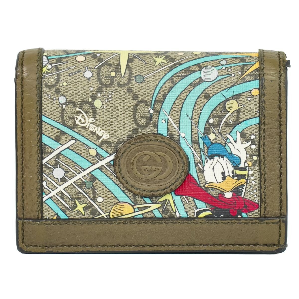 グッチ　ドナルド　財布 GUCCI WALLET DONALD DUCK GUCCI GG Disney X Donald Duck Canvas & Leather Bifold Wallet