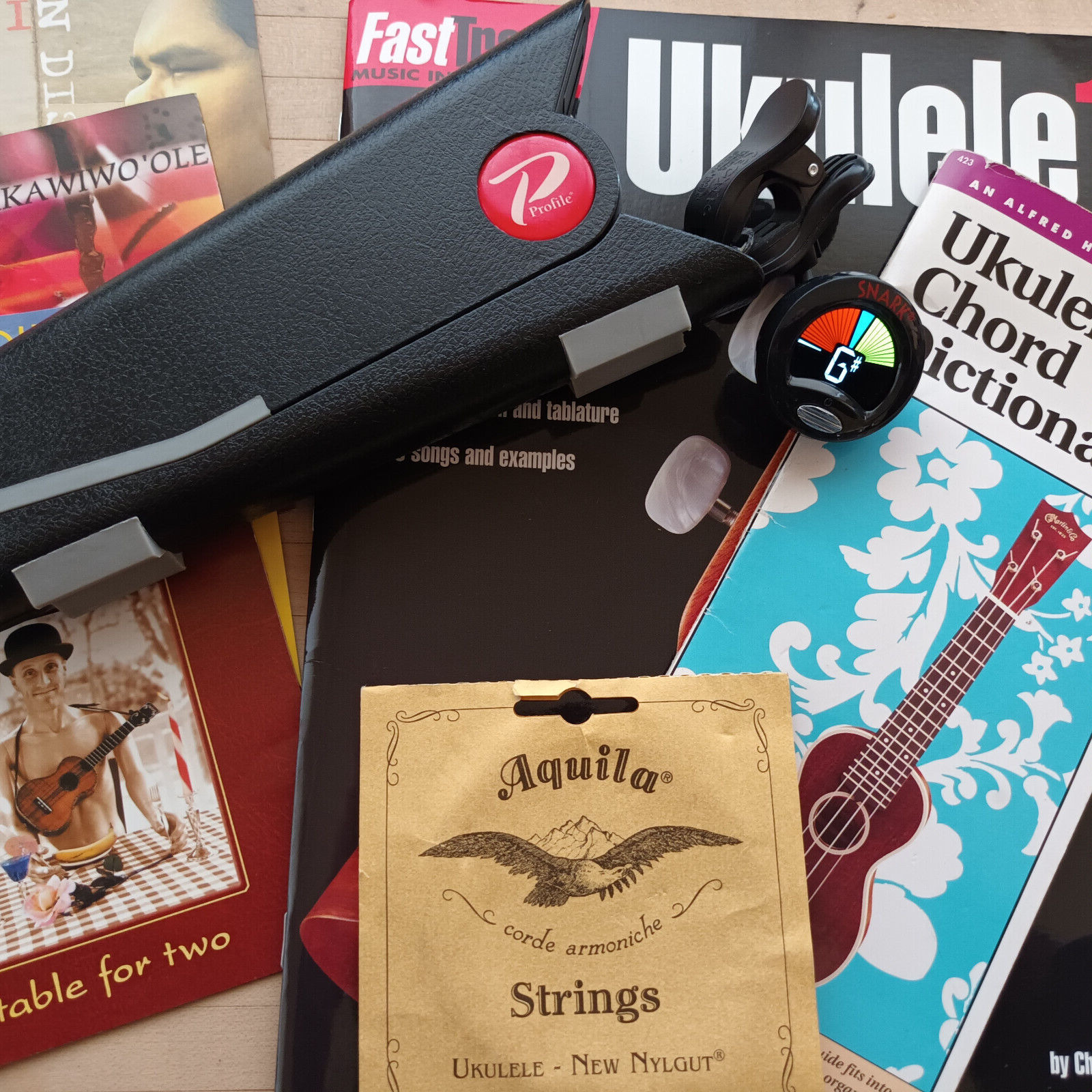 Ukulele Bundle-Books, Snark Tuner-Stand-Strings-4xCD's-Everything perfect cond.