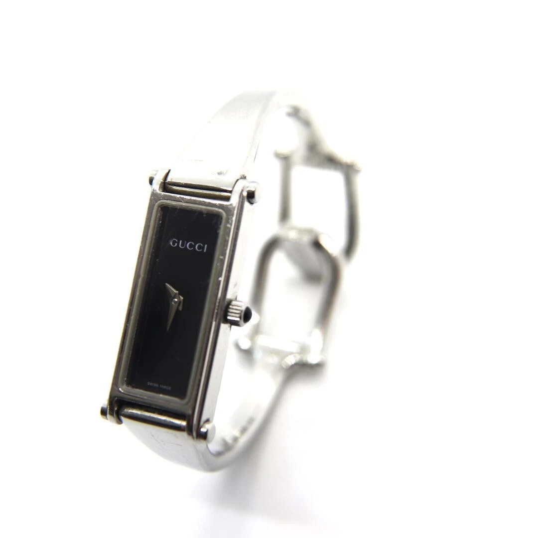 Montre Gucci 1500L 12 mm rectangle argent noir quartz femme Swiss Made Japan