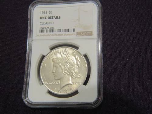 1935 Peace dollar in a NGC holder with UNC details