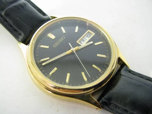 Vintage Seiko Gold Tone Black Dial Dress Watch 7N43-8A99 Day Date New Battery
