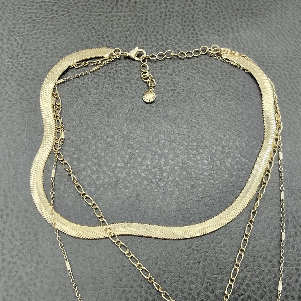 Collar BCBGeneration de 3 hilos en capas tono dorado Starburst dije perla cristal Foto 4 de 4