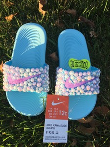 baby blue nike slides
