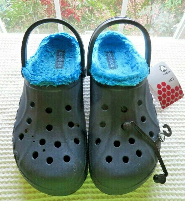 teal fuzzy crocs