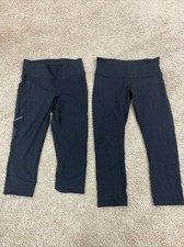 Two Pairs Of Woman?s Size 6 Luluemon Black Capri Leggings