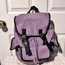 Mochila de lona a lunares rosa Candies con correas de ribete de cuero sintético negro