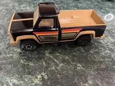 Vintage 1970 Tonka Corp. Black Rainbow Striped Press Steel Pick Up Truck