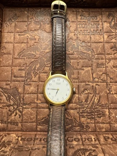 Seiko V700-6321 Vintage Quartz Watch with Gold Tone Case and Brown Leather Strap