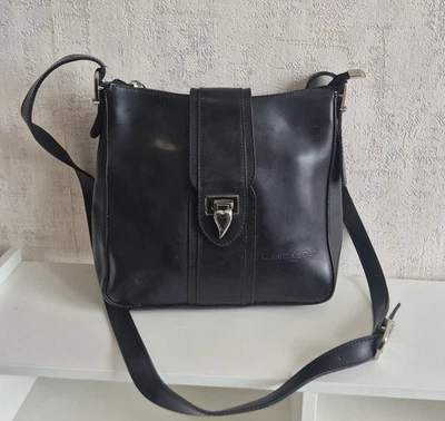 sac bandoulière lancaster vintage cuir noir femme rabat fermoir coeur - Photo 1/4