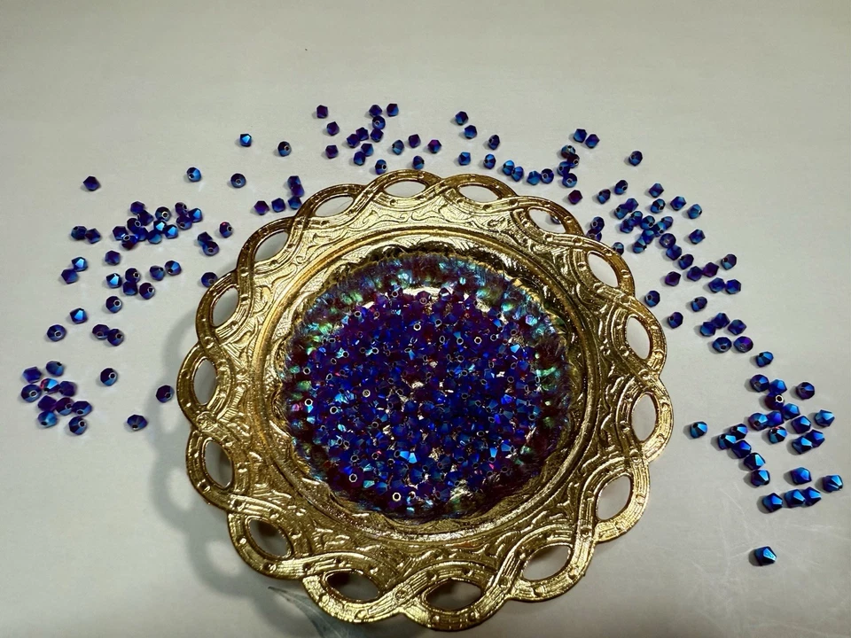 Bicones Swarovski Siam AB2X 5328 4mm Foto 2 de 4