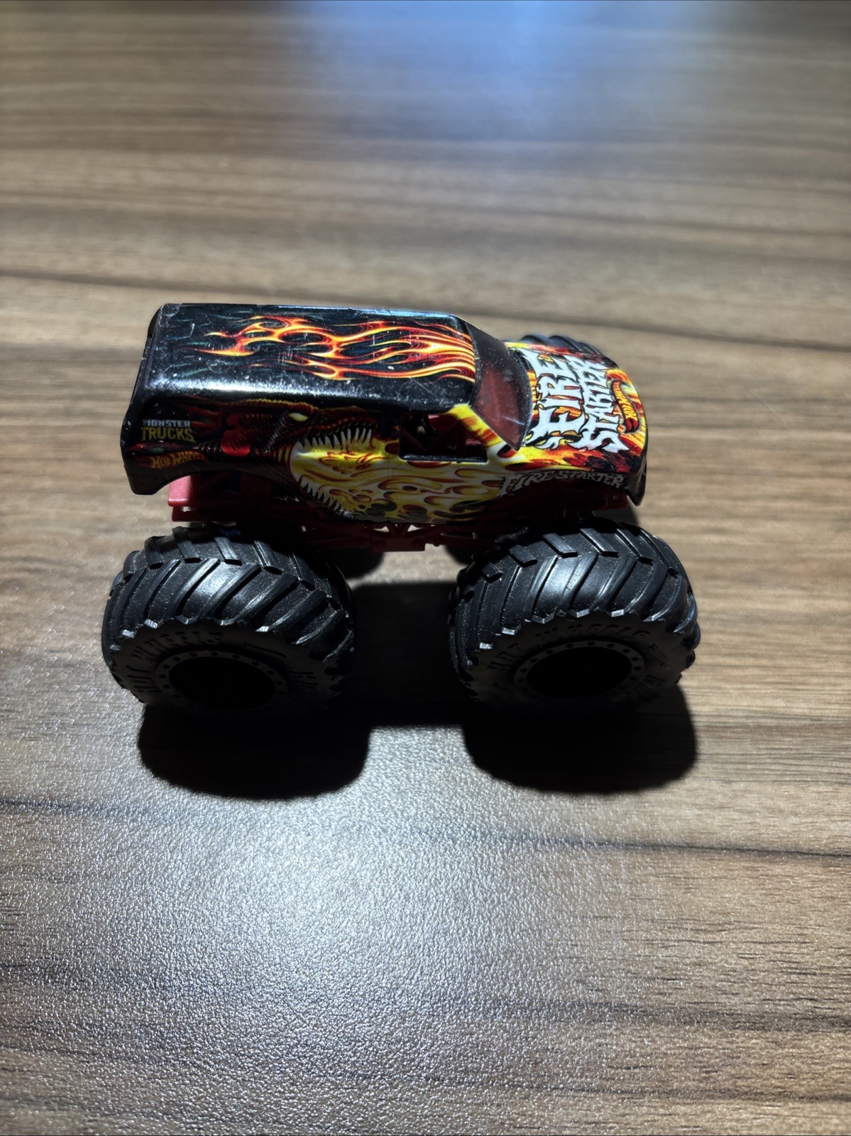 Hot Wheels Monster Jam Fire Starter 1:64 Scale Truck Black Wheels