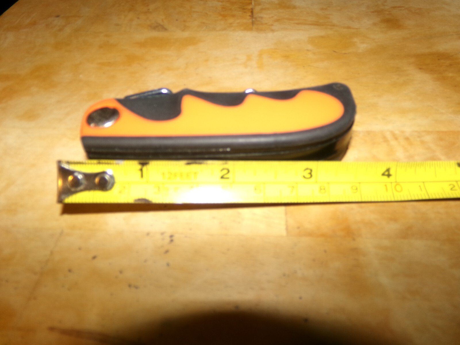 FOLDING UTILITY KNIFE WITH A LIGHT PLASTIC ORANGE FOLDING UTILITY KNIFE-BELTHOLD