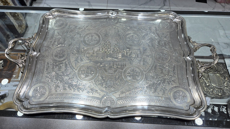 A MONUMENTAL SILVER TRAY. St Petersberg, c. 1870. Bright cut engraved with town