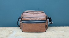 Brown faux leather vintage-style crossbody camera bag. Good Condition